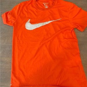 large orange nike logo shirt